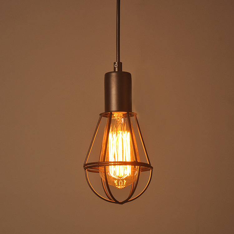 Moodly Cage black wire cage pendant light with a glowing filament bulb