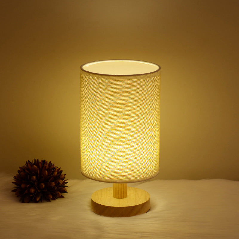 Moodly Nook table lamp with a jute shade, switched on