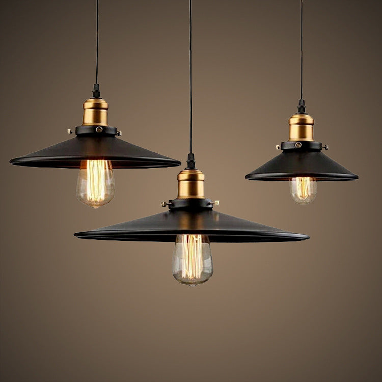 Three Moodly Loft black metal pendant lights with glowing filament bulbs