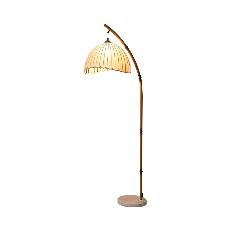 Moodly Arc floor lamp with marble base on a white background