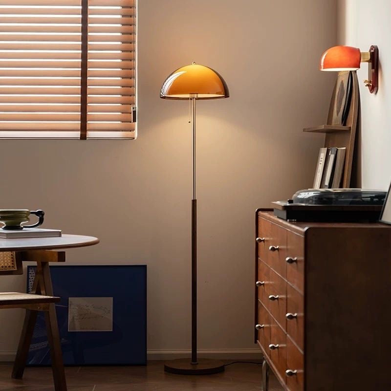 Moodly Amber floor lamp in a living room with a matching wall light